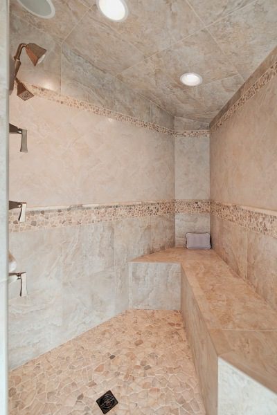 custom-tan-tiled-walk-in-shower-with-bench