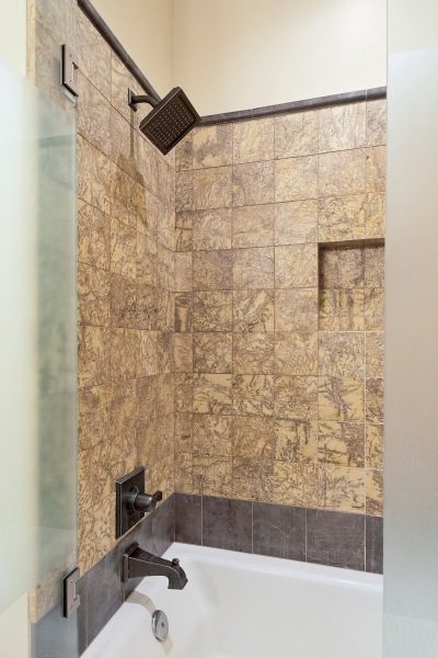 Custom Light Brown Tile Tub Shower Combo