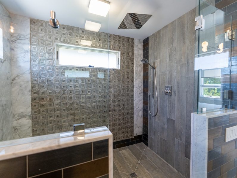 Custom Tile Ceiling Shower Head And Glass Door