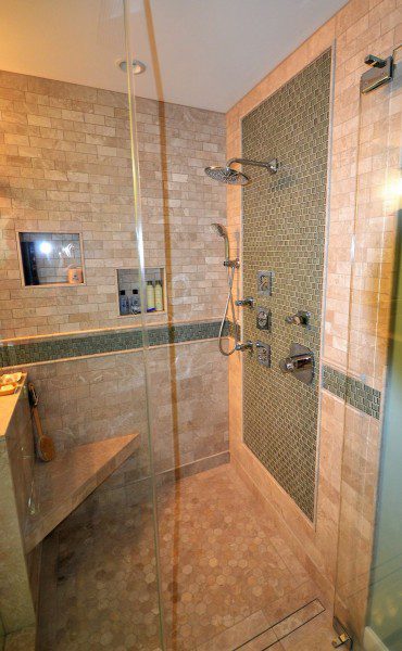 Bathroom with Adjustable Shower Head and Glass Door