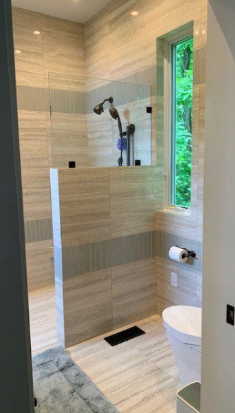 walk-in-custom-shower-light-brown-tile-single-white-toilet