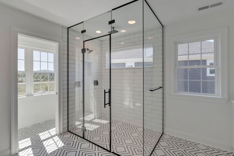 Bramante-walk-in-shower-with-center-drain-custom-tile-glass-walls