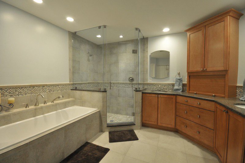 Sherwood-bathroom-with-three-wall-alcove-tub-walk-in-shower-wood-sink-base